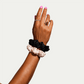 Model wearing medium pack silk scrunchies 