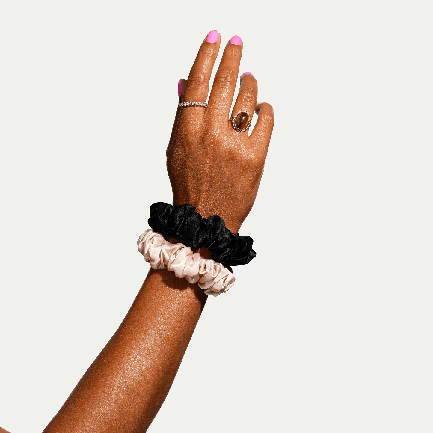 Model wearing medium pack silk scrunchies 